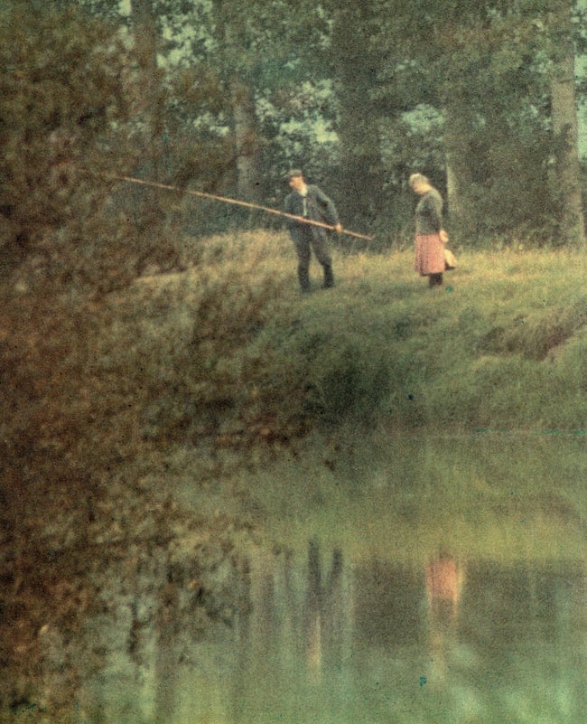 IRVING PENN - Couple Fishing on the Bank of Seine, France, 1951: DescriptionArtist: IRVING PENNPrint Title: Couple Fishing on the Bank of Seine, France, 1951Medium: PhotolithographPrinted 1980’s in the USImage size (inches) approx.9.5 x 8”Irving Penn was an