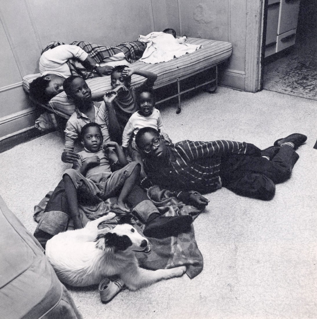 BRUCE DAVIDSON - East 100th Street, 1968, (with dog): Artist: BRUCE DAVIDSON Print Title: From East 100th Street, 1968 Medium: Sheet-fed photogravure Printed 1960’s in Switzerland Image size (inches) approx. 9.5 x 9.5” Bruce Landon Davidson B