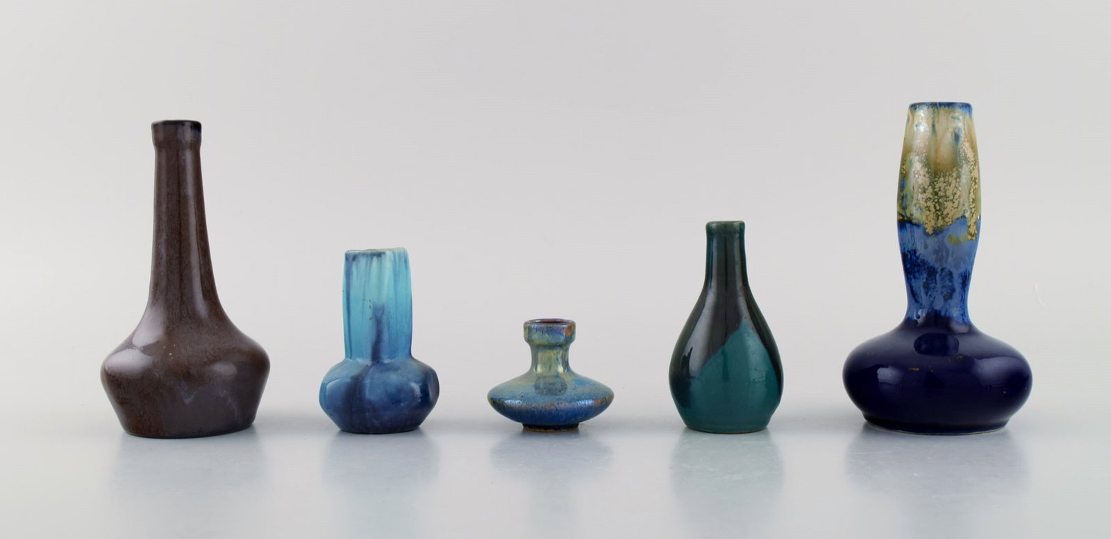 Five Belgian miniature vases in glazed ceramics. Mid-20th century.: Five Belgian miniature vases in glazed ceramics. Mid-20th century. Largest measures: 13 x 7.8 cm. In excellent condition. Stamped. Reserve: $175.00 Shipping: Domestic: Shipping rates are determined by