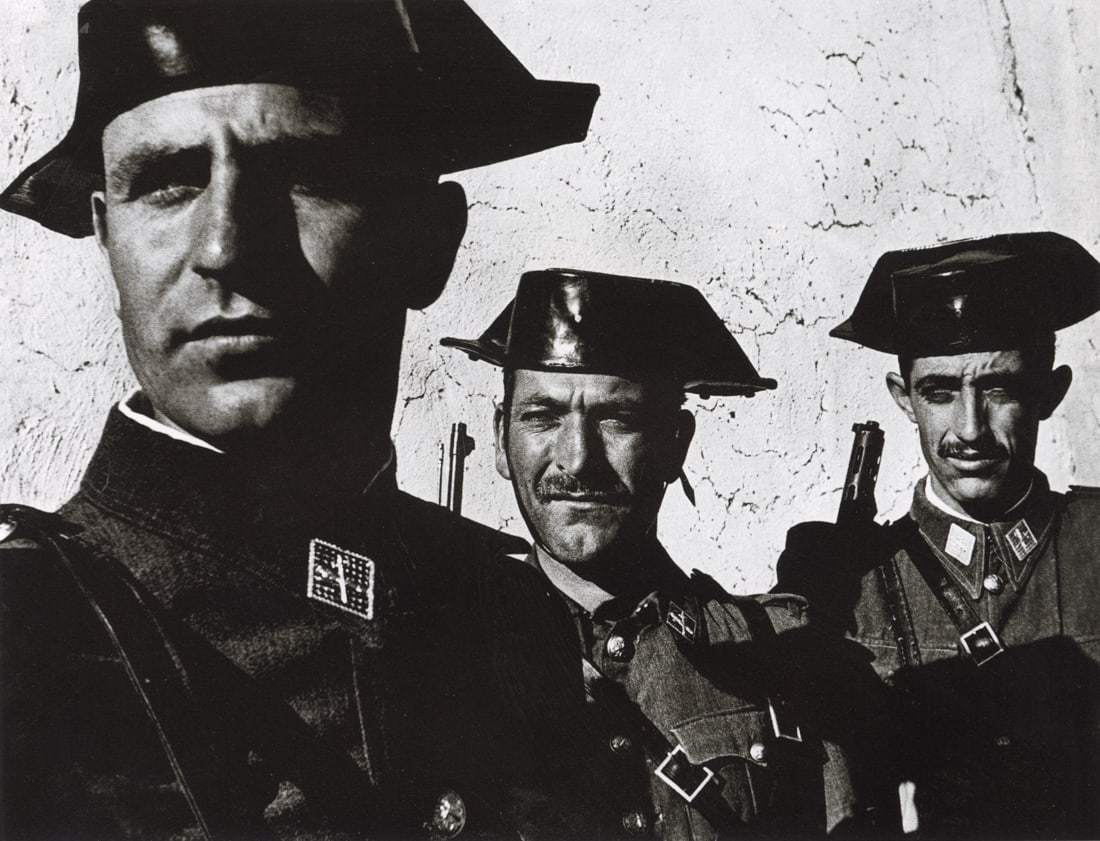 W. EUGENE SMITH - Spanish Civil Guard, 1950: Artist: W. Eugene Smith Title: Spanish Civil Guard, 1950 Medium: Photo Litho, 2008, Thailand Dimensions: 8.8x6.75" Description: Heat Wax Mounted on 8.5x11" Conservation Board Artist Bio: W. Eugene Smi