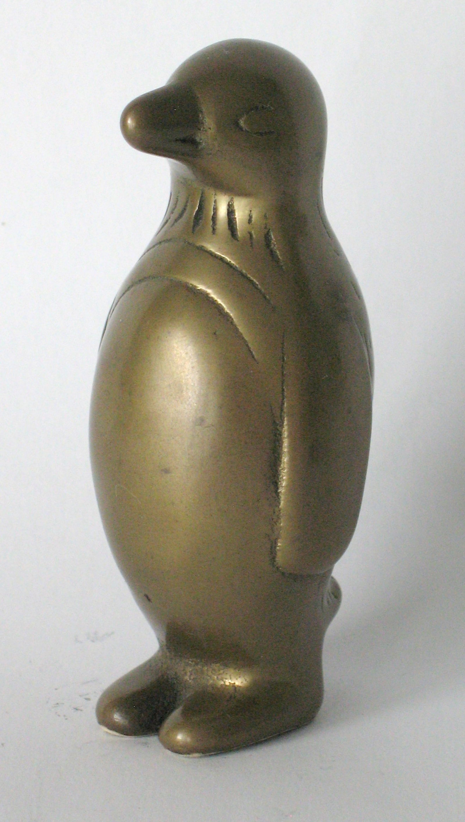 Vintage cast brass Penguin paper weight. (1 of 3)