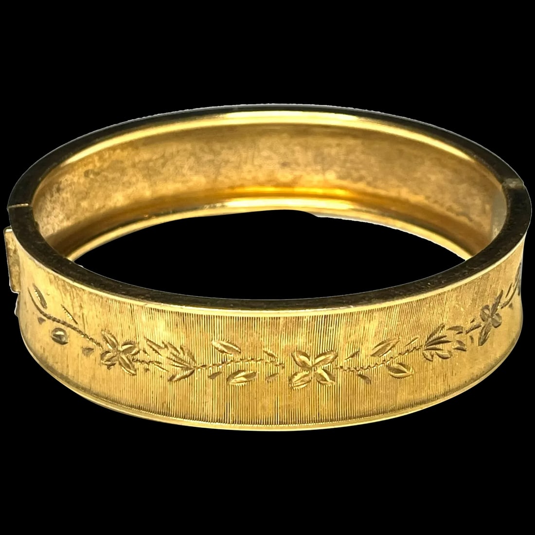 Vintage Floral Etched Gold Hinged Bracelet: Vintage Textured Floral Etched Bracelet 12k Gold Fill 21 grams Circumference 7 inches Reserve: $70.00 Shipping: Domestic: Flat-rate of $15.00 to anywhere within the contiguous U.S. International: