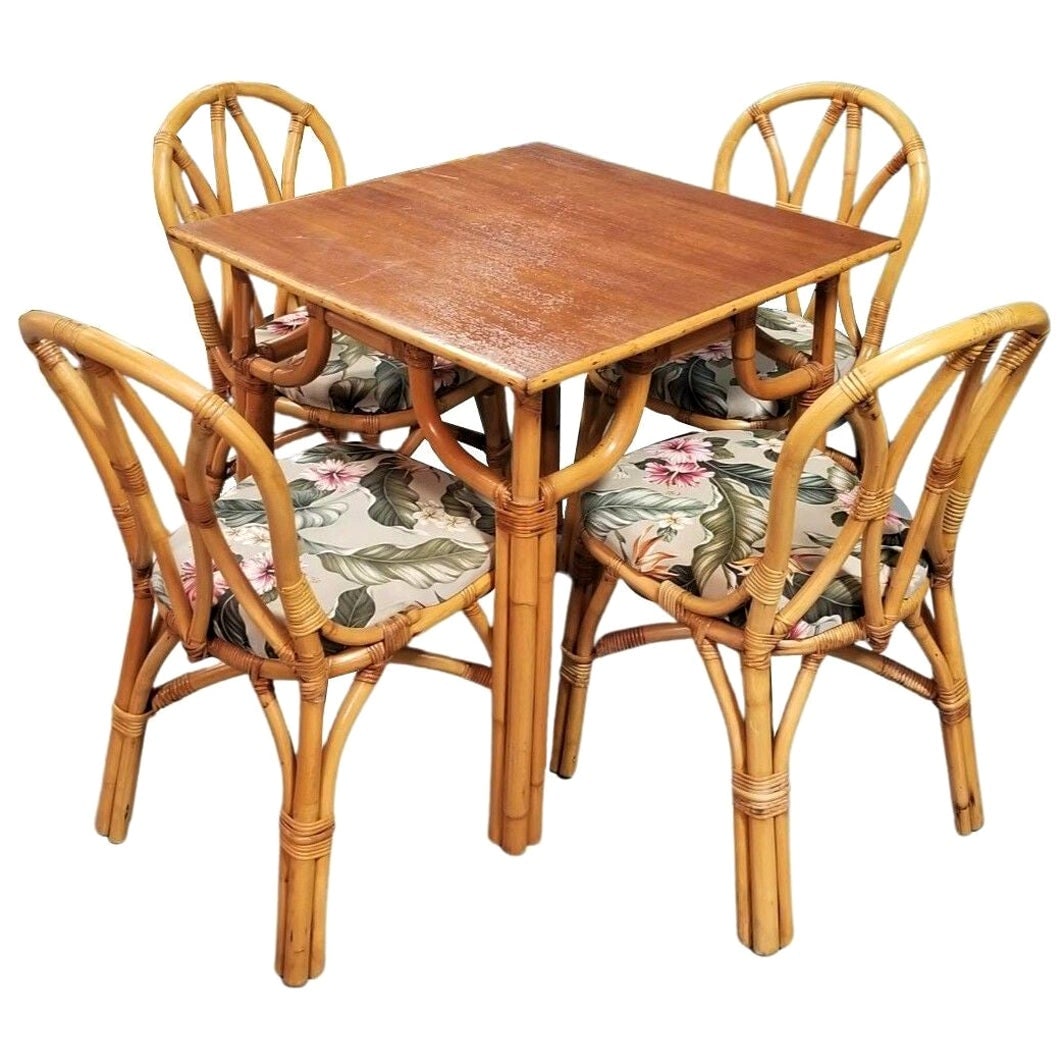 Restored Rattan 3-Strand "Hour Glass" Dining Table & Chairs Dining Set: About the Item Restored Mid-Centyury 4-person 3-strand mahogany dining table and 4 "Hour Glass" rattan back chairs. Dimensions: Chair: 32" H x 24" W x 22" D Table: 30.75" H x 30.5" W x 29.5" D We only