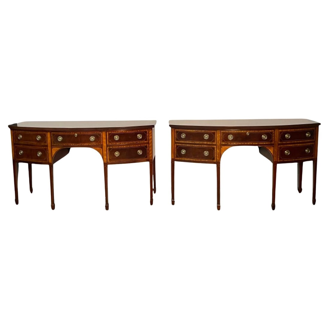 Baker Furniture, Georgian, Sideboards, Mahogany, Satinwood, Brass, 1980s: About the Item Pair of Baker Mahogany Satinwood Sideboards or Credenzas, 'Historic Charleston Collection', Bow Front Fine condition. Pair of fully refinished Baker Furniture Console Tables featuring i