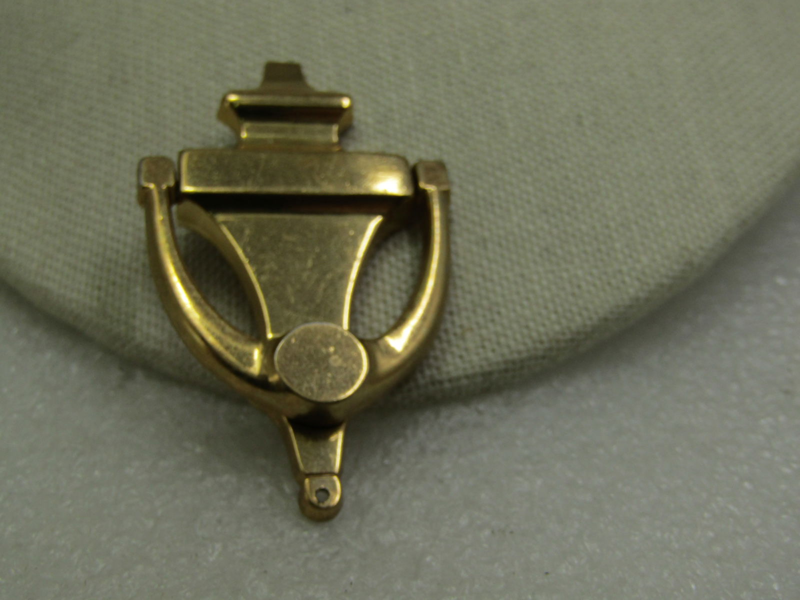 Vintage Door Knocker Brooch, Signed Coro, 1940's-1950's, 2.5": Vintage Door Knocker Brooch, Signed Coro, 1940's-1950's, 2.5" tall, 1.5" wide. Gold tone. Signed Coro on the back. Smooth finish with hinged knocker. There is a whole on the bottom where there was a c