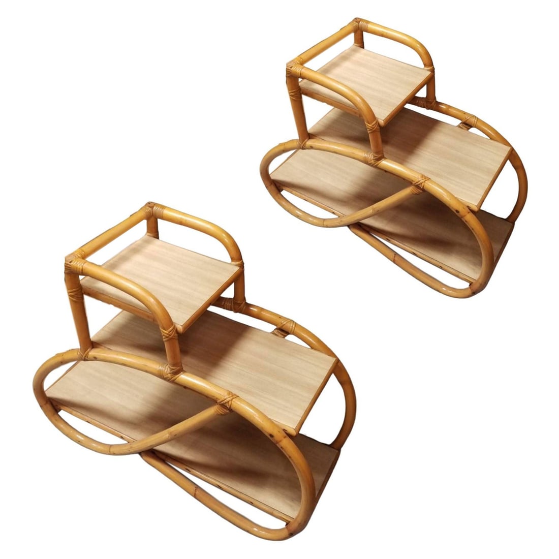 Restored Rattan Side Tables 3-Tier 3/4 Pretzel Arms w/ Formica Top: About the Item Rattan side table 3-tier of shelves with 1 strand 3/4 pretzel rattan arm and a soft beige Formica table top finish - Set of 2. Perfect alongside your bed or sofa. Circa 1950, USA We onl