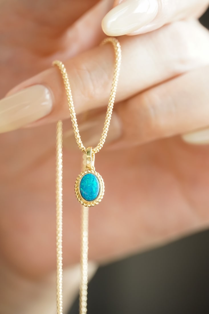 One 18K gold opal pendant (1 of 5)