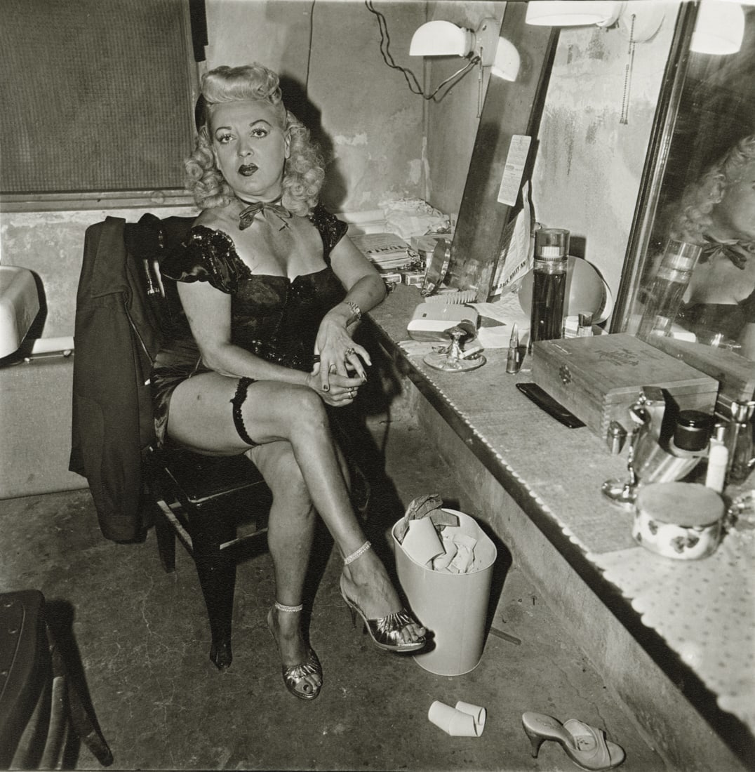 DIANE ARBUS - Burlesque Commedienne in Dressing Room: Artist: Diane Arbus Title: Burlesque Commedienne in Her Dressing Room, Atlantic City, NJ, 1963 Medium: Photo Litho, 1997, Italy Dimensions: 8.35x8.5" Description: Heat Wax Mounted on 11x14" Conservati