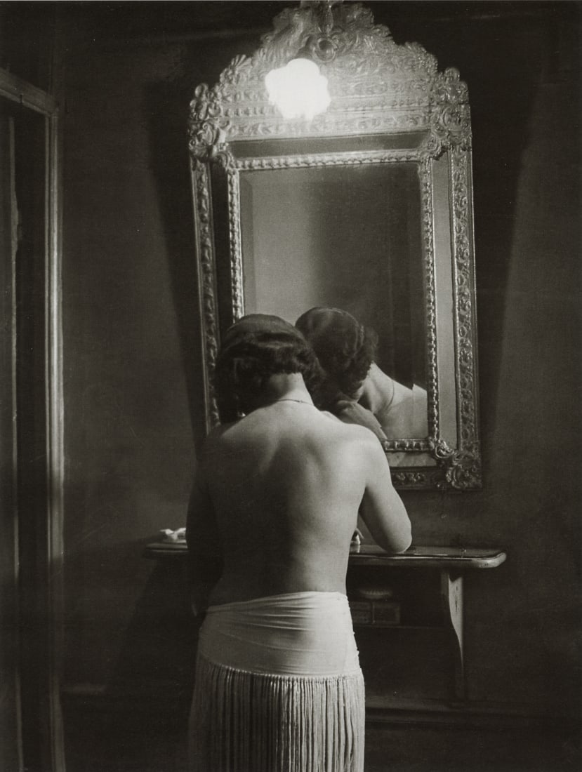 BRASSAI - At Suzy's, 1932: Artist: Brassai Title: At Suzy's, 1932 Medium: Photo Litho, 2000, Italy Dimensions: 7.5x9.95" Description: Heat Wax Mounted on 11x14" Conservation Board Artist Bio: Brassai was a Hungarian-French phot