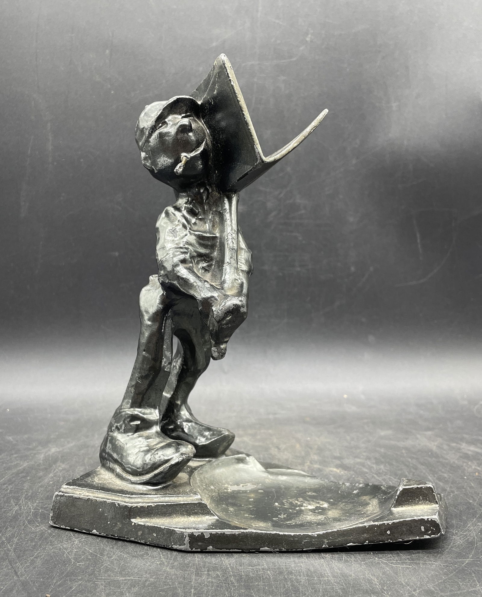 1930S ART DECO FRANKART SMOKING AT CONSTRUCTION JOB HOD CARRIER ASHTRAY: Title: 1930S ART DECO FRANKART SMOKING AT CONSTRUCTION JOB HOD CARRIER ASHTRAY Date/Period: APPROX 1930'S Dimension: approx 8" Material: heavy metal, non-magnetic Additional Information: 1930S ART DEC