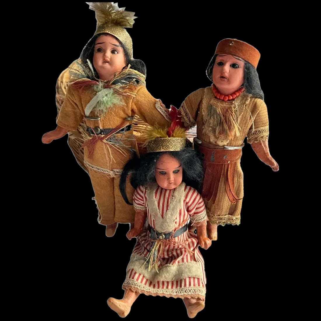 Antique American Indian bisque Dolls three from original family: These three dolls are one male 8" and two female 7" bisque Indian dolls came as a family so I wanted to keep them together and not separate ,they are all original.. marked 20/0 on the back of their he