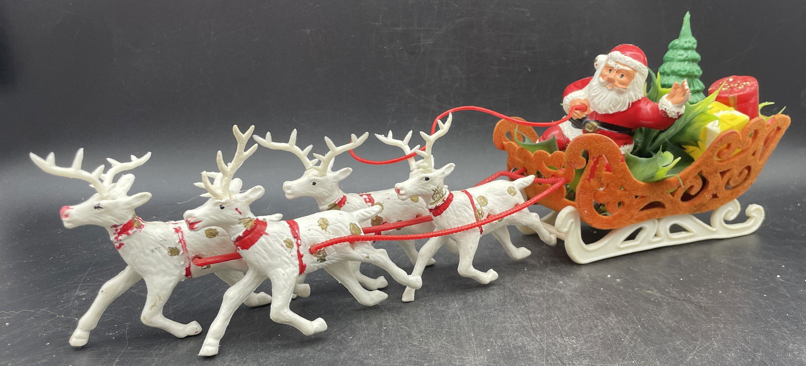 Vintage 15" Santa Claus Sleigh and Reindeer Flocked Sleigh: Title: Vintage 15" Santa Claus Sleigh and Reindeer Flocked Sleigh Date/Period: approx 1950's Dimension: approx: 15'long x 5.5 x 3 Material: plastic Additional Information: Vintage Santa Claus Sleigh a