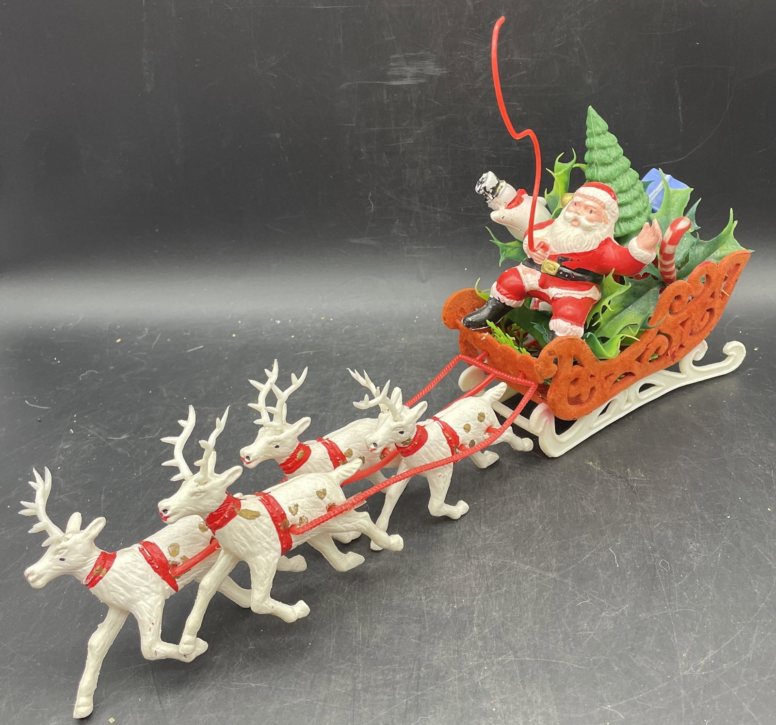 Vintage Christmas Santa Sleigh 4 Reindeer Flocked Plastic Decoration: Title: Vintage Christmas Santa Sleigh 4 Reindeer Flocked Plastic Decoration Date/Period: approx 1950's Dimension: approx: 13 x 6 x 4 Material: plastic Additional Information: Vintage Santa Claus Sleig