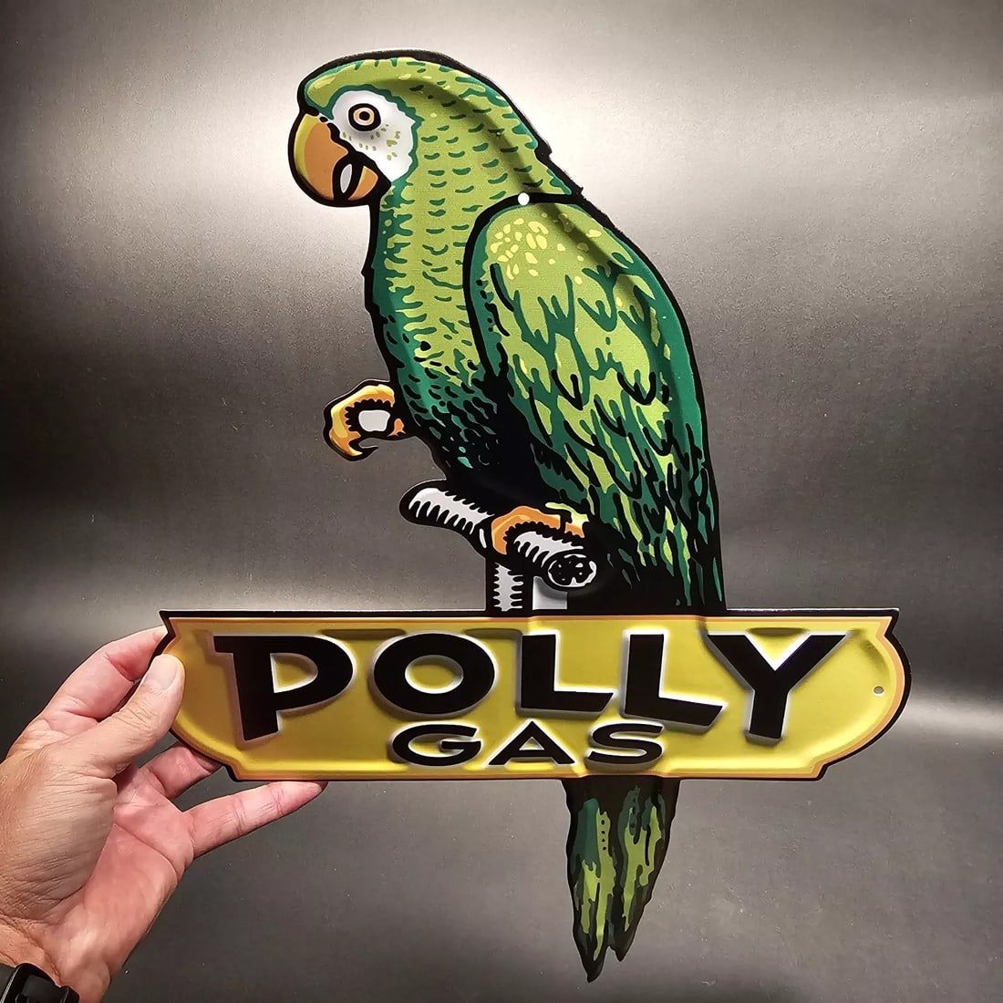 18" Old Style Metal Polly Gas Car Sign: 18" x 13 3/8" Wonderful reproduction Polly Gas plaque or sign. Good detail and color! Styled to look vintage. Certainly hard to tell its age. Reserve: $28.00 Shipping: Domestic: Flat-rate of $10.00 to