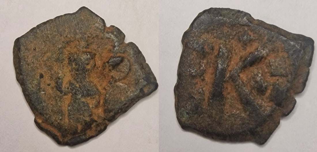 The Byzantine Empire: Title: The Byzantine Empire Description: Maurice Tiberius, 582 - 602 Date/Period: 582-602 Materials: bronz coin Dimensions: 19.6 mm Reserve: $10.00 Shipping: Domestic: Flat-rate of $13.00 to