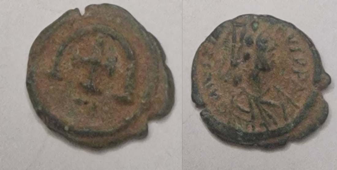 The Byzantine Empire: Title: The Byzantine Empire Description: Justinian I AD 527-565 AE Date/Period: 527-565 Materials: bronz coin Dimensions: 16.3 mm Reserve: $10.00 Shipping: Domestic: Flat-rate of $13.00 to a