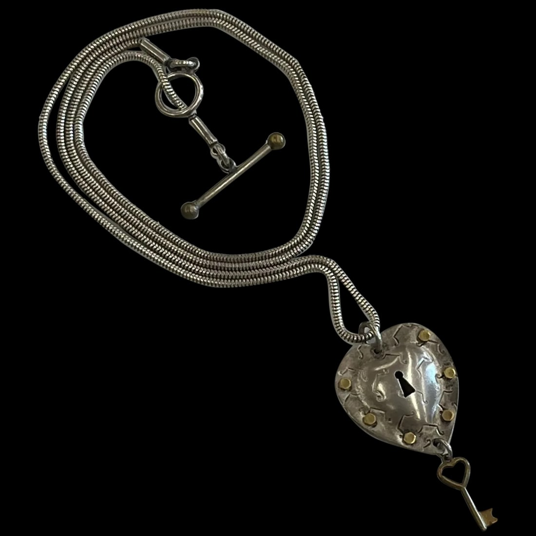 Estate Thomas Mann Sterling Silver and Bronze Mixed Metal Techno Steam Punk Heart Necklace with Key: Title: Estate Thomas Mann Sterling Silver and Bronze Mixed Metal Techno Steam Punk Heart Necklace with Key Description: Estate Thomas Mann Sterling Silver and Bronze Mixed Metal Techno Steam Punk Hear