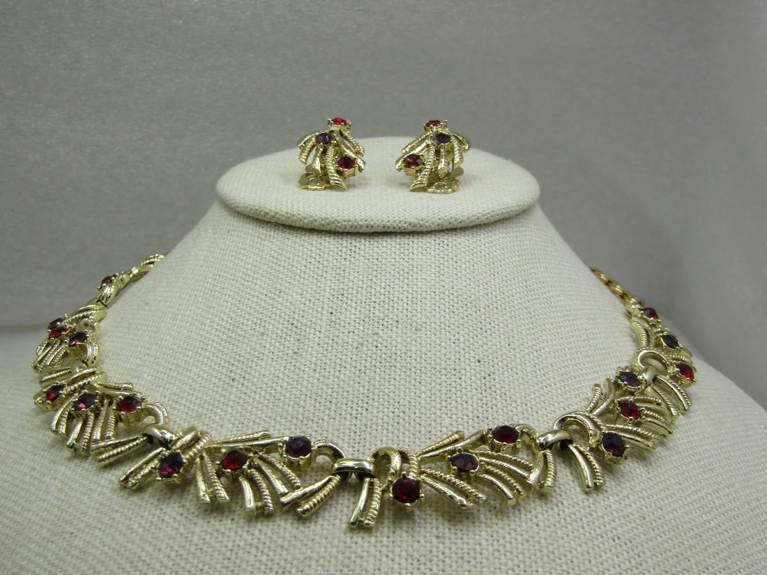 Vintage Coro Red Rhinestone Necklace & Earrings Set, Mid-Century,: Vintage Coro Red Rhinestone Necklace & Earrings Set, Mid-Century, 16" necklace with hook clasp to adjust. Clip Earrings. The necklace has textured wispy accents with red rhinestones, with 7 links that