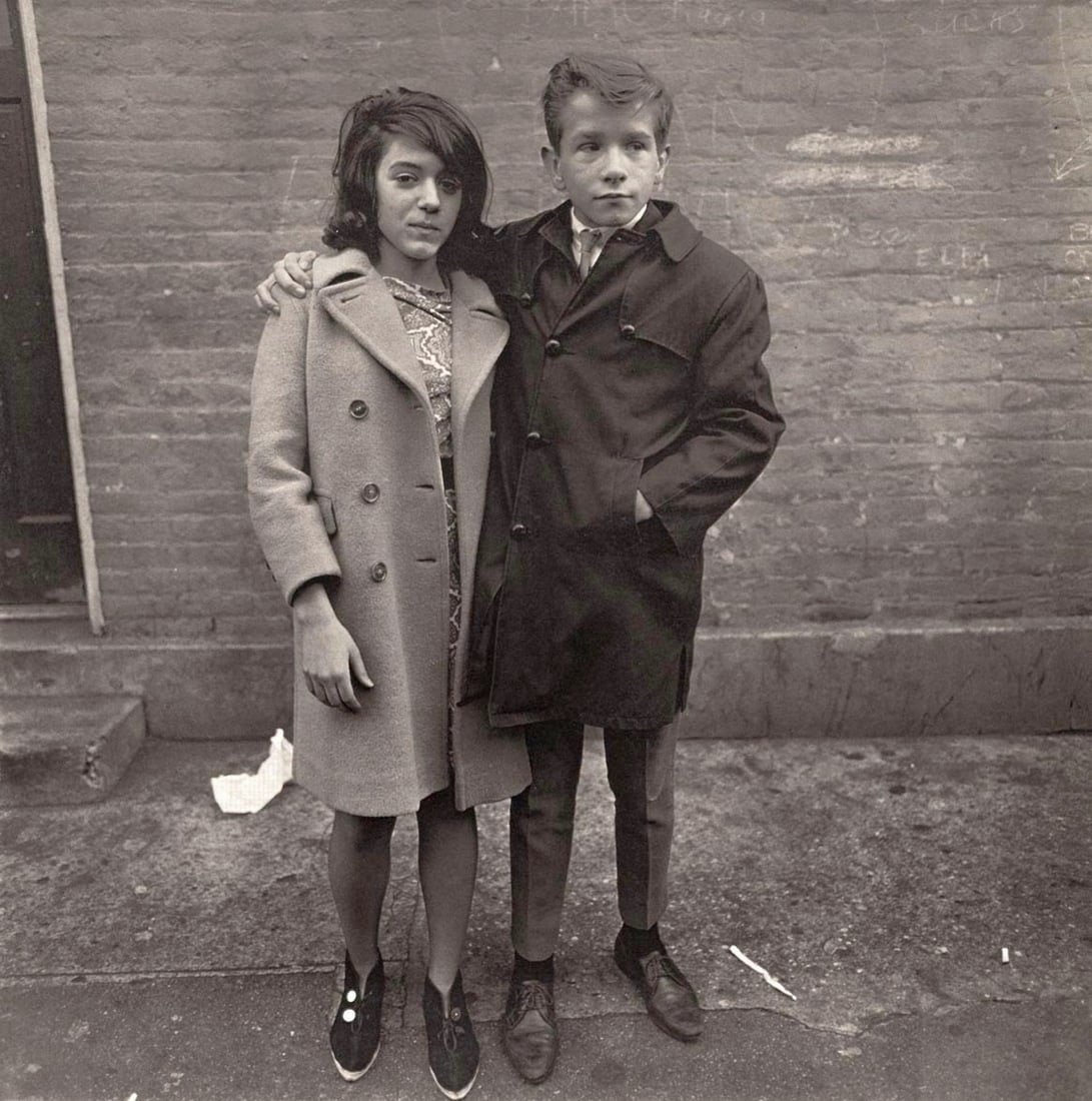 DIANE ARBUS - Teenage couple on Hudson St, NYC, 1963: Artist: DIANE ARBUS Print Title: Teenage couple on Hudson St, NYC, 1963 Medium: Photoengraving Printed 1970’s in the US Image size (inches) approx. 8 x 8” Diane Arbus (1923 –1971),wa