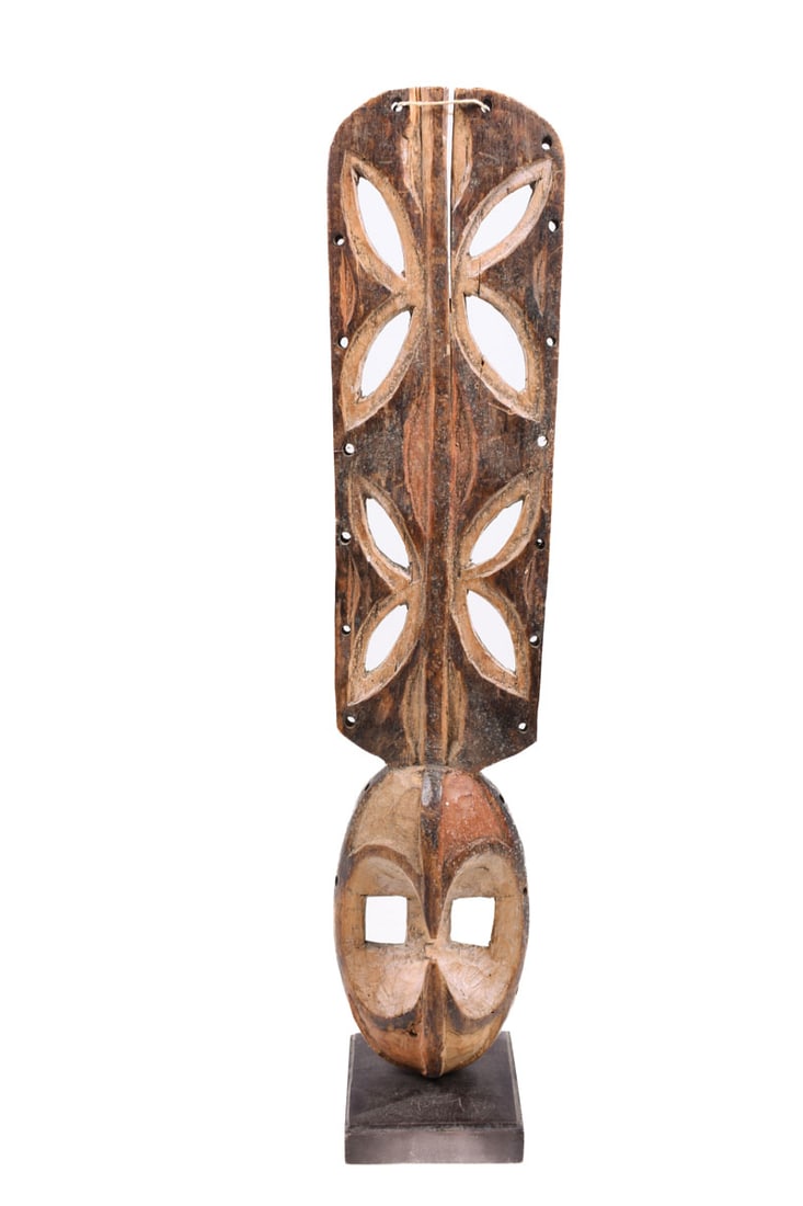 Afikpo Mask - Wood - IGBO / IBO - Nigeria: Igbo-Afikpo Mask mma ji. "Yam root knife" (Mma ji) called mask, the plank-like forehead extension represents a machete that was used in field work and used to be a weapon. In particular, it`s said to