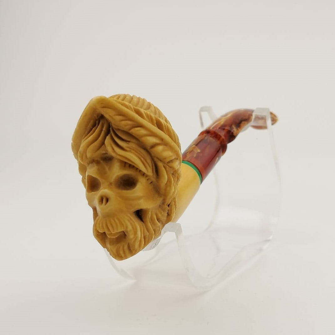 Zeus Skull,Meerschaum Pipe: Title: Zeus Skull,Meerschaum Pipe Materials: Meerschaum Dimension: 5.5 inch (14cm) Additional Information: Zeus Skull,Hand carved Meerschaum Pipe. Made in Turkey,Eskisehir by Meerschaum Carve Master.B