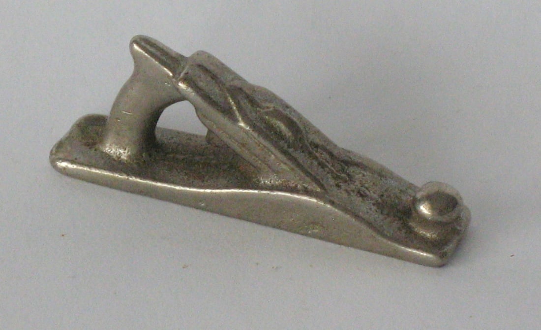 Antique cast iron carpenter's wood plane paper weight. (1 of 2)