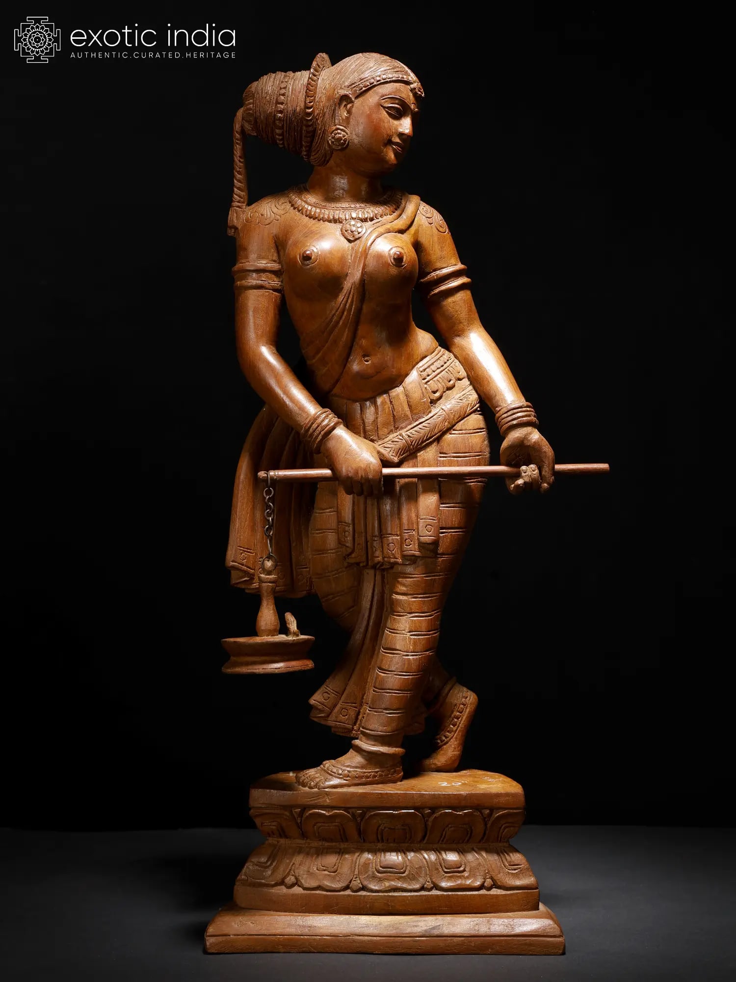 21" Apsara | Wood Carved Statue: Title: 21" Apsara | Wood Carved Statue Description: Wood Carved Statue Height: 21 inch Width: 9.5 inch Depth: 6 inch Weight: 2.80 kg Additional Information: With his elephantine grace and wisdom, “G