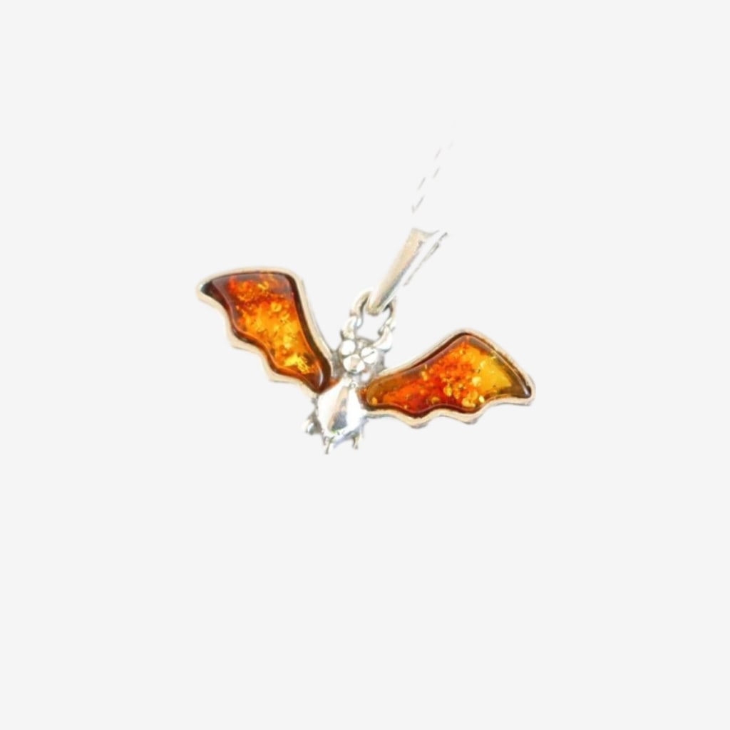 Adorable Bat Necklace|Genuine Baltic Amber|.925 Silver: Title: Adorable Bat Necklace|Genuine Baltic Amber|.925 Silver Description: Add some quirks to your everyday style with our Adorable Bat Necklace. Crafted from genuine Baltic Amber, this .925 Sterling 