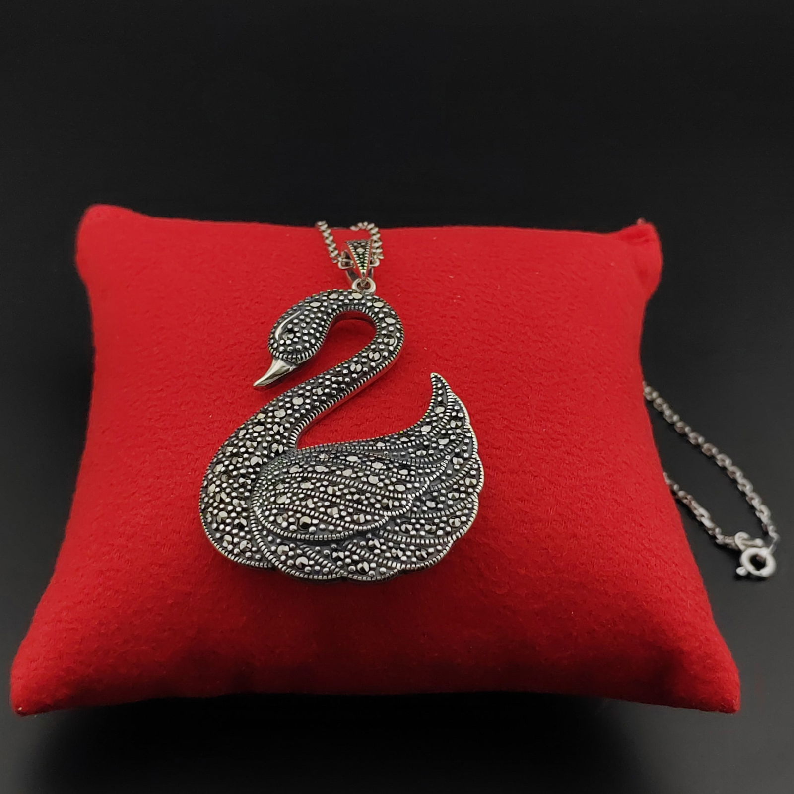 925 Silver Swan Ladies Necklace with Marcasite: Title: 925 Silver Swan Ladies Necklace with Marcasite Description: 925 Silver Chain with Swan Pendant -Total Weight:13.9g -Size: Chain Size:19.68 in(50cm). Pendant Size:1.33x2.12 in (34x54mm) (Bail in