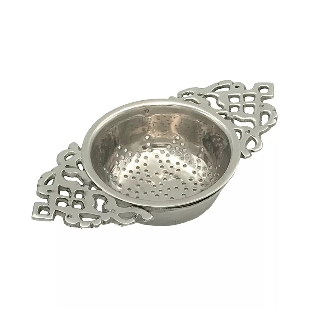 4-1/2" Tea Strainer: 4 inches long, 2-1/2 inches wide, and 3/4 inches high Strain your tea in style using our elegant reproduction tea strainer. It's made of silver plated brass with beautifully detailed handles. A perfec