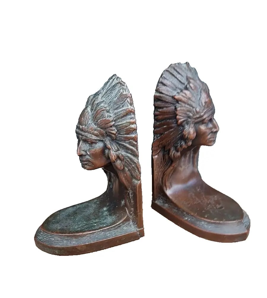American Indian Headdress Bookends 1920: Neat pieces in good condition. Great patina. One has a crack. Shipping costs include insurance. Shipping: Domestic: Flat-rate of $25.00 to anywhere within the contiguous U.S. International: Foreign sh