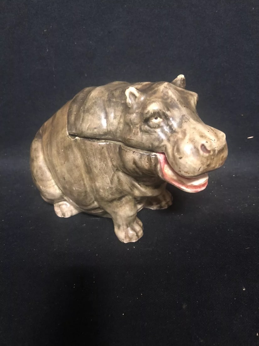Rare Majolica Hippo Humidor: It measures 6 3/4” x 3 1/2” x 5” and is marked. It has a small chip on one foot. Otherwise it has no other issues Shipping: Domestic: Flat-rate of $15.00 to anywhere within the conti