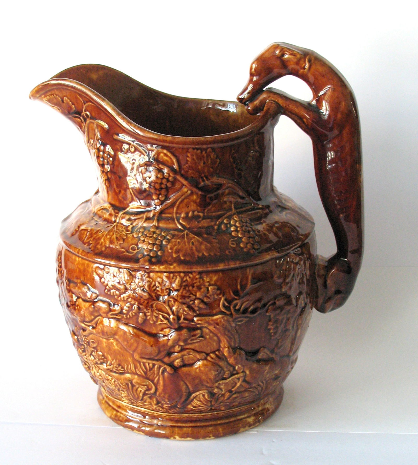 Antique hound handle Bennington Pottery cider jug. (1 of 6)
