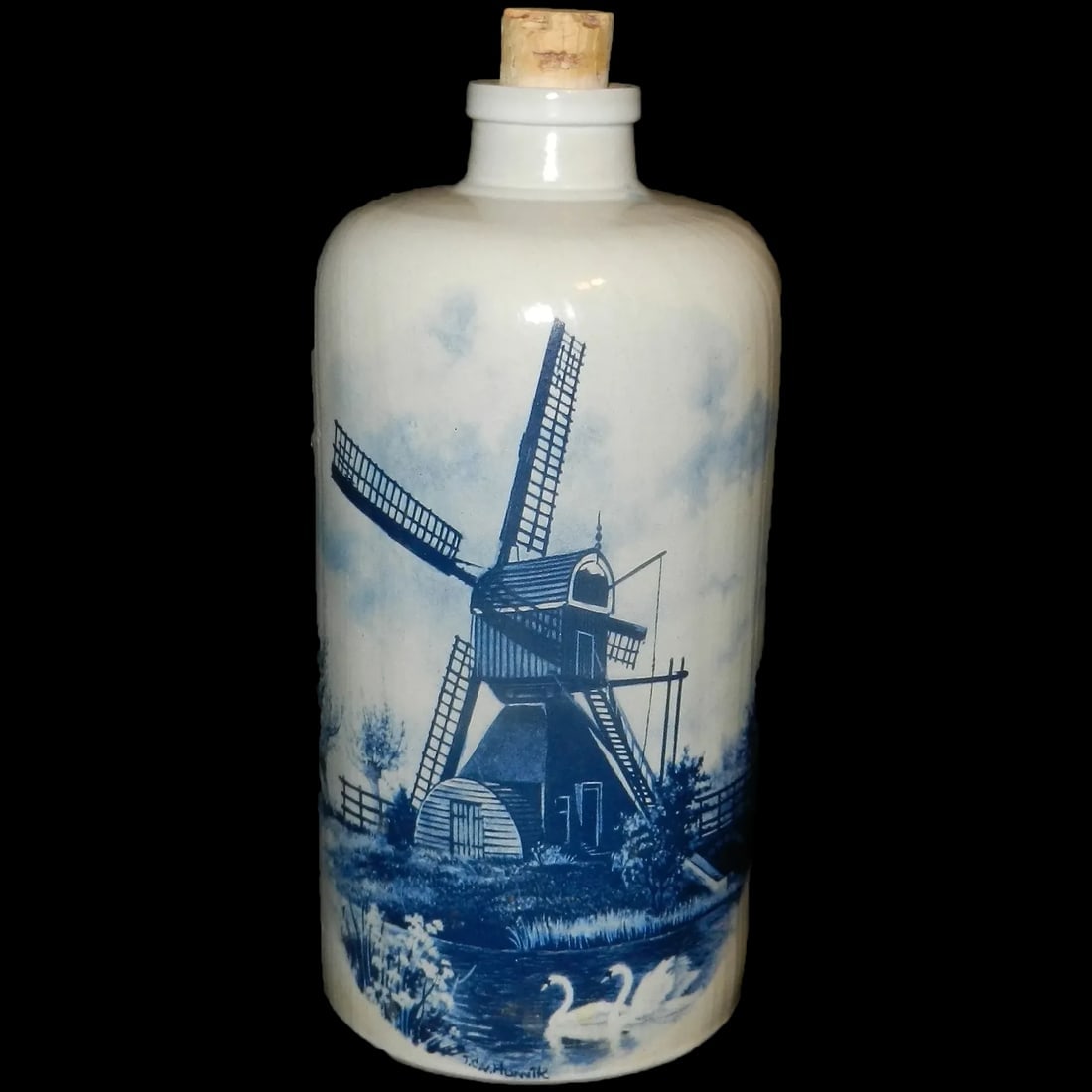 Vintage Delft Crock Corked Hand Decorated Jug Made in Holland: This Vintage Delft Crock Corked Hand Decorated Jug Made in Holland is in excellent condition. Stamped on the bottom Ter Steege BV Delft Blauw Handpainted Made in Holland. Decorated with the classic Wi