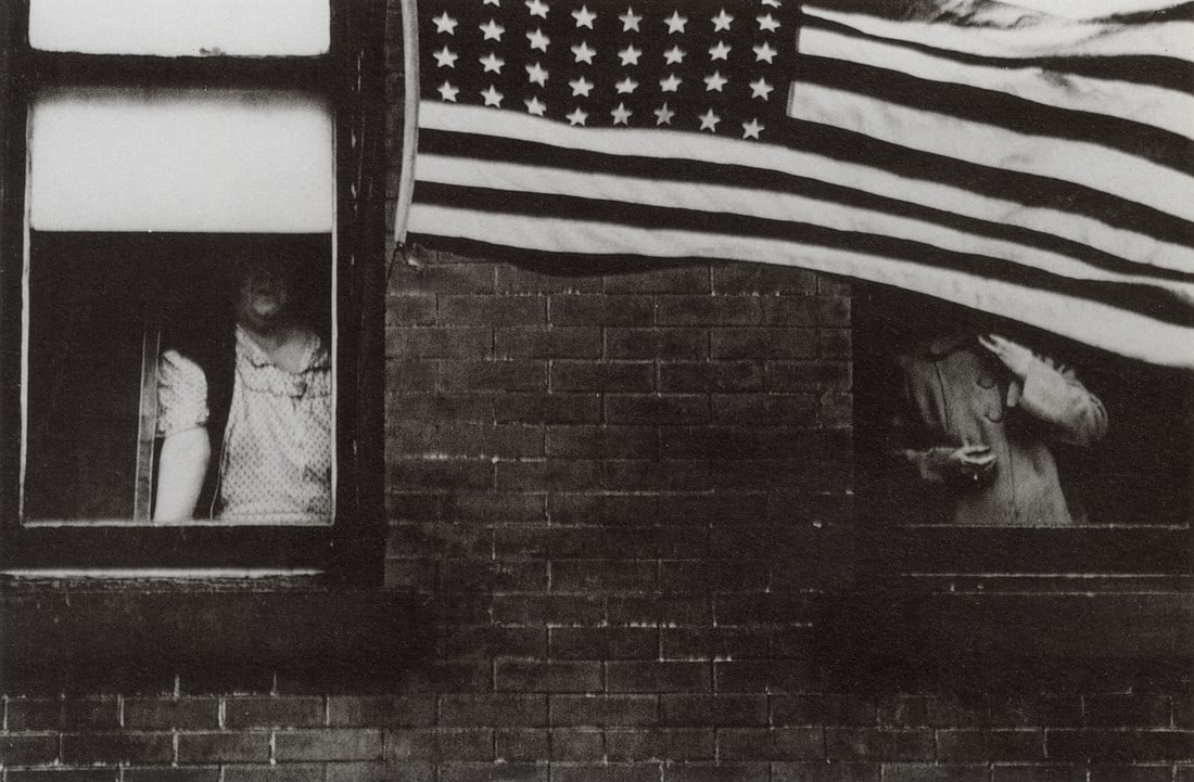 ROBERT FRANK - Parade, Hoboken, New Jersey: Artist: Robert Frank Title: Parade, Hoboken, New Jersey Medium: Photo Litho, 1997, Italy Dimensions: 8.6x5.65" Description: Heat Wax Mounted on 8.5x11" Conservation Board Artist Bio: Robert Frank (192