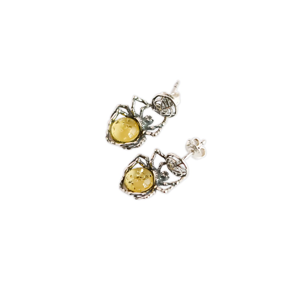 Baltic Amber Spider Earrings In 925 Sterling Silver: Title: Baltic Amber Spider Earrings In 925 Sterling Silver Description: Get tangled in the spooky season (or year round) with our Baltic lemon amber spider earrings! Made with 925 sterling silver and 