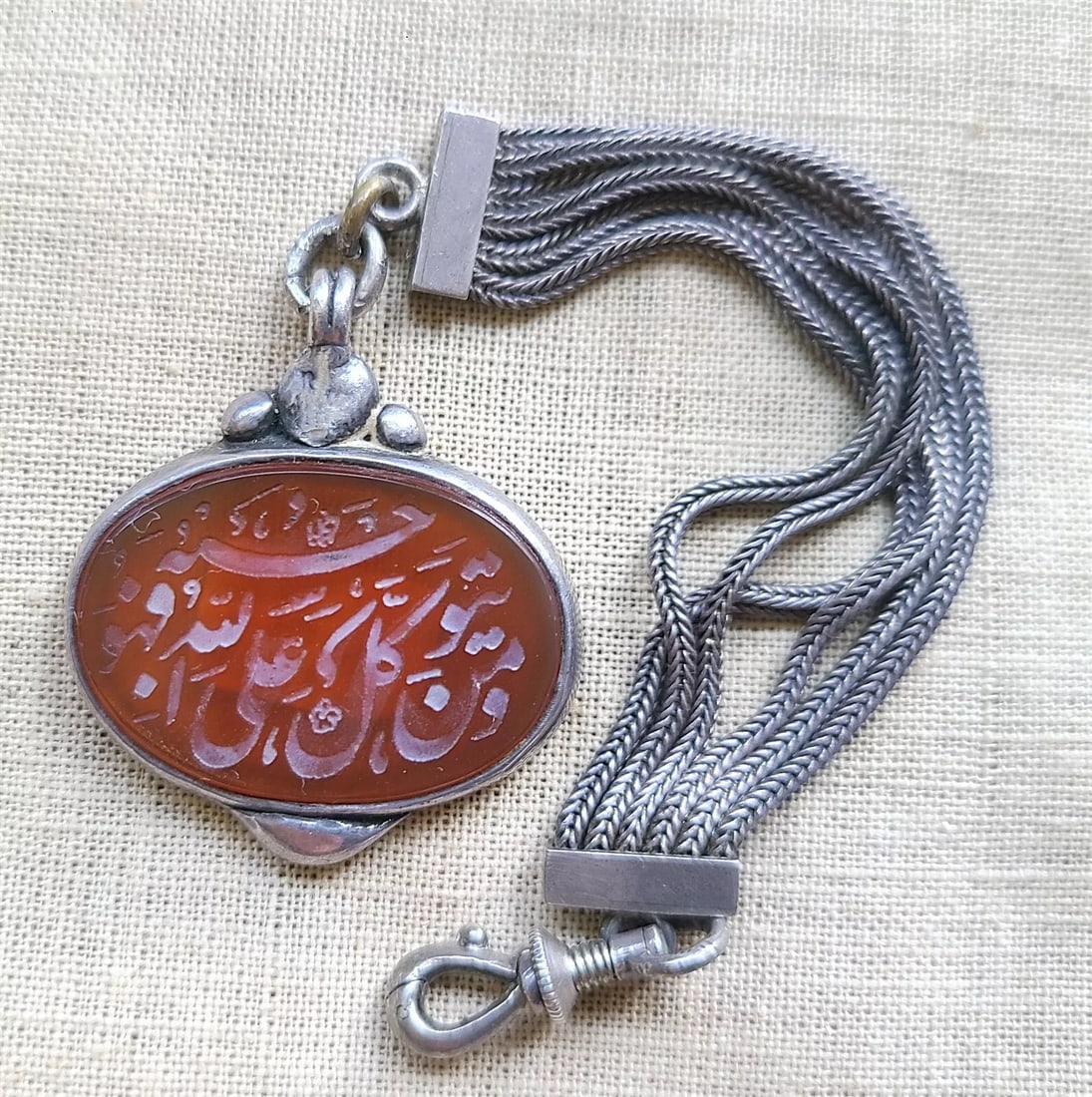 VINTAGE SILVER WATCH FOB w/ ARABIC koranic INSCRIBED SEAL CARVING on CARNELIAN: Unmarked. Size 3/4 by 1 1/4" Very good condition Please see my other auctions Reserve: $151.00 Shipping: Domestic: Flat-rate of $25.00 to anywhere within the contiguous U.S. International: Foreig