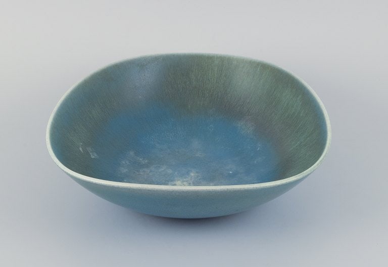 Berndt Friberg for Gustavsberg, Sweden, large ceramic bowl with glaze in blue-green tones.: Berndt Friberg for Gustavsberg, Sweden, large ceramic bowl with glaze in blue-green tones. Mid-20th century. Perfect condition. Signed. Dimensions: D 32.0 cm x H 9.5 cm. Reserve: $1,050.00 Shipping: D