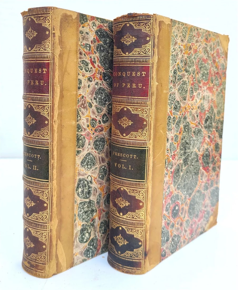 1865 HISTORY of CONQUEST of PERU by PRESCOTT 2 VOLUMES antique CIVIL WAR ERA: HISTORY of THE CONQUEST of PERU by WILLIAM PRESCOTT 2 VOLUMES , complete set Philadelphia ; 1865 Original 3/4 leather over marbled boards, marbled endpapers and edges. Spines with raised bands and tit