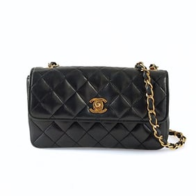 CHANEL Mini Matelassè shoulder bag in black lambskin