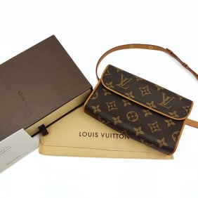 LOUIS VUITTON Florentine clutch bag in monogram canvas