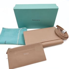 TIFFANY & CO. wallet with shoulder strap in beige leather