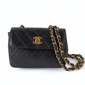 CHANEL Timeless Classic mini shoulder bag in black leather