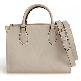 LOUIS VUITTON OnTheGo Empreinte PM shoulder bag in ivory leather
