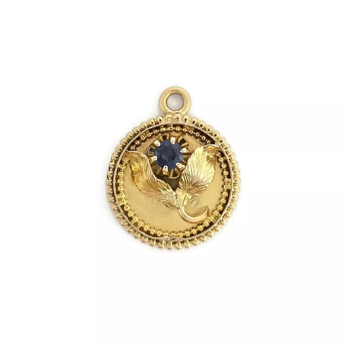 Vintage 1940's Sapphire Flower Pendant Charm 14K and 12K Yellow Gold, 1.95 Grams: Vintage 1940's Sapphire Flower Pendant Charm 12K 14K Yellow Gold, 1.95 Grams This is a unique vintage charm. Circa: 1940's Gemstone: 1 round blue sapphire .14 ct Metal: 14K and 12K yellow gold (differ