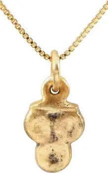 EUROPEAN WOMAN'S PENDANT, C.1450-1650: Gilt bronze, about 5/8" total height. formed as a triangle of depressed center circles. This form is thought to derive from the Medici family coat of arms. The original symbol for pawnbrokers was thre