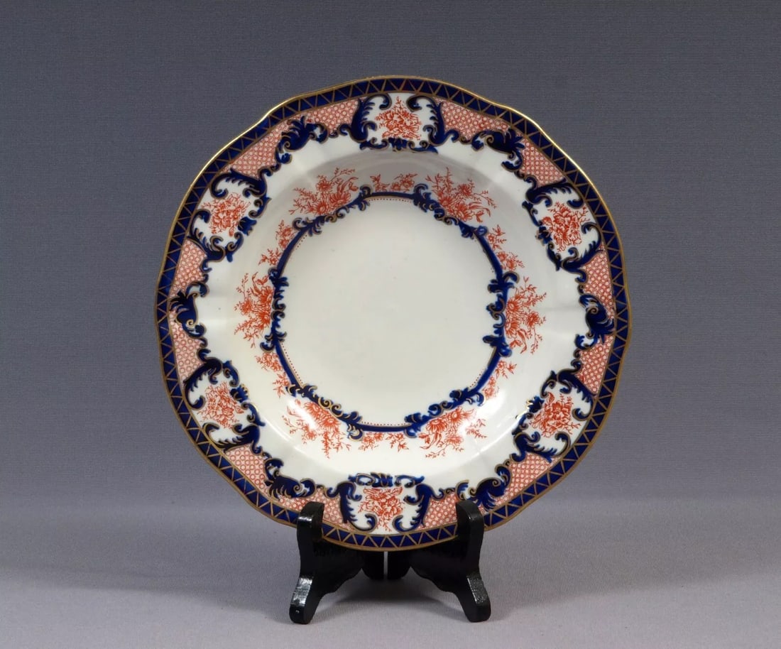 ROYAL CROWN DERBY IMARI Rimmed Soup Plate Bowl c 1900s England: A Beautiful Antique Royal Crown Derby Imari one Rimmed Soup Plate/Bowl in their famous Imari pattern. It is decorated in the Rich Imari 3653 Pattern. This is an Oriental, Imari-Inspired pattern, ornat