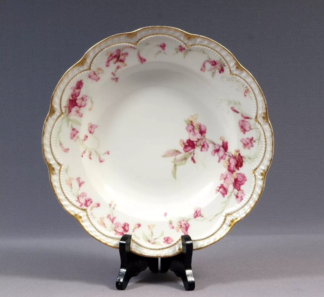 Limoges France HAVILAND Soup Plate Bowl J.J.Harte Amsterdam Pink Iris Sweet Pea: This is a rare and gorgeous Rimmed Soup Plate/Bowl, made in Limoges, France by Theodore Haviland. The plate is made explicitly for J. J. Harte. It has pink flowers and vines. The plate is 9 1/2" in di