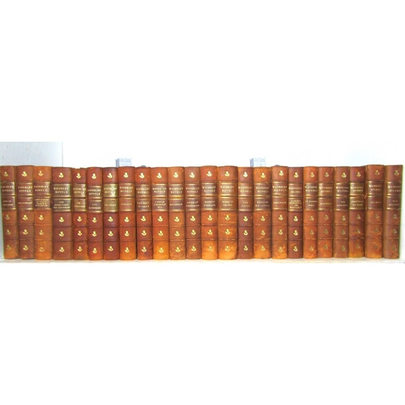 The Waverley Novels - 24 Volumes: Large type border edition. Contemporary half-calf. Morocco gilt titles. Etched frontispieces and plates. Occasional light spotting and browning, extremities rubbed. VOLUME I: 'Waverly'; VOLUME II: 'Mo