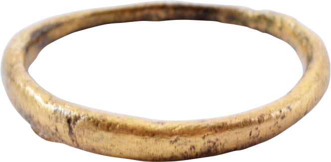 VIKING WEDDING RING, 10th-11th CENTURY AD, SIZE 4 ¼: 10th-11th century AD. Gilt bronze size 4 ¼, tapered from 1.2mm to 2.4mm at the top, a very rare form. Made to be worn on the small finger as was the custom. Vikings exchanged rings on the pommel